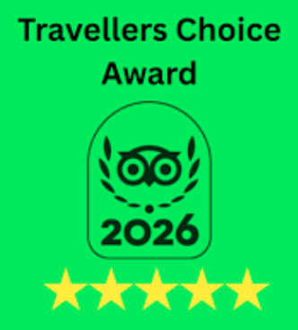 Green badge with owl symbol, text 'Travellers Choice Award 2026', and five yellow stars below.