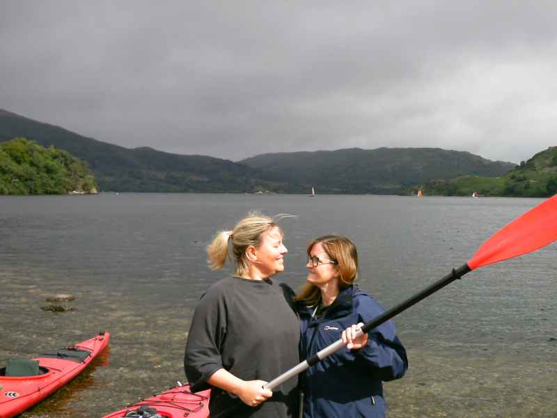 Romantic Kayaking on Ullswater | Lake District for Couples A couple kayaking together on Ullswater, surrounded by stunning Lake District scenery.