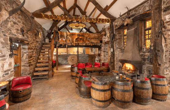 The Quiet Site, a peaceful camping and lodge retreat nestled in the Lake District, with scenic views of rolling hills and tranquil valleys. The area features well-maintained pitches, cozy lodges, and a tranquil atmosphere.