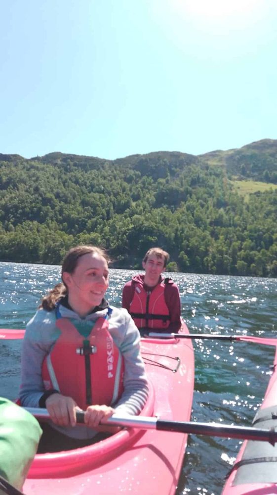 A couple enjoying a Tall Bloke Adventures Kayak Tour on Ullswater
